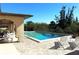 Inviting community pool with lounge chairs, providing a relaxing and enjoyable outdoor space at 1217 Aqui Esta Dr # 5, Punta Gorda, FL 33950