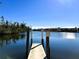 Scenic waterfront dock with a 'Private Residents & Guests Only' sign, offering exclusive access and views at 1217 Aqui Esta Dr # 5, Punta Gorda, FL 33950