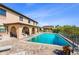 Community pool with lounge areas and landscaping, great for relaxation at 1217 Aqui Esta Dr # 5, Punta Gorda, FL 33950