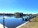 Scenic water view with docks, calm water, and clear blue sky, offering serene waterfront living at 1217 Aqui Esta Dr # 5, Punta Gorda, FL 33950