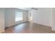 Bedroom with hardwood flooring and a view to a bathroom at 1351 Washington Dr, Englewood, FL 34224