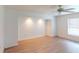 Large bedroom has hardwood floors, fan and recessed lighting at 1351 Washington Dr, Englewood, FL 34224