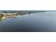 Beautiful aerial view of the complex overlooking the water, with pier, docks and waterfront access at 14459 River Beach Dr # 112, Port Charlotte, FL 33953