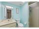Bright bathroom with a shower, toilet, and vanity at 14459 River Beach Dr # 112, Port Charlotte, FL 33953