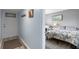Comfortable bedroom with two beds, stylish decor, and a serene atmosphere at 14459 River Beach Dr # 112, Port Charlotte, FL 33953