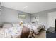 Inviting bedroom with twin beds, mirrored closet doors, and a peaceful setting at 14459 River Beach Dr # 112, Port Charlotte, FL 33953