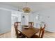 Dining area features wood table set with views to the kitchen and plenty of room for entertaining at 14459 River Beach Dr # 112, Port Charlotte, FL 33953