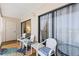 Relaxing lanai with comfortable seating and views of the living area at 14459 River Beach Dr # 112, Port Charlotte, FL 33953