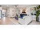 Stylish living room featuring neutral decor, plush seating, modern accents and plenty of natural light at 15968 Crofton Springs Way, Port Charlotte, FL 33953