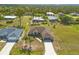 An aerial shot showing a well-manicured front yard and a home's placement in the neighborhood at 16094 Ortega Dr, Punta Gorda, FL 33955