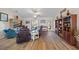Open living room featuring hardwood floors, neutral decor, and stylish furnishings at 16094 Ortega Dr, Punta Gorda, FL 33955