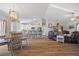 Open floorplan with living room, kitchen with bar stool seating and dining area at 16094 Ortega Dr, Punta Gorda, FL 33955