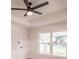 Bedroom with ceiling fan and natural lighting at 17130 Elder St, Port Charlotte, FL 33954
