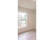 Bright bedroom featuring a large window with a view at 17130 Elder St, Port Charlotte, FL 33954