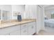 Bathroom with double vanity, stone counters, and ensuite access at 1734 Saddlewood Cir, Port Charlotte, FL 33953