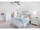 Bright bedroom with neutral decor and ensuite bathroom access at 1734 Saddlewood Cir, Port Charlotte, FL 33953