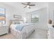 Well-lit bedroom with ceiling fan, ensuite access, and calming decor at 1734 Saddlewood Cir, Port Charlotte, FL 33953