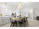 Open dining room with a view of the kitchen and living space at 1734 Saddlewood Cir, Port Charlotte, FL 33953