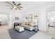 Bright living room features neutral decor, tile flooring, and a ceiling fan at 1734 Saddlewood Cir, Port Charlotte, FL 33953