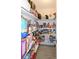 Pantry with tiled floor and stocked shelves with a variety of food at 190 Casa Ln, Punta Gorda, FL 33950