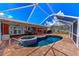 Beautiful pool and spa with covered lanai and patio furniture for relaxing and entertaining at 190 Casa Ln, Punta Gorda, FL 33950