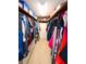 The expansive walk-in closet has lots of shelving, drawers and space for hanging your clothing at 190 Casa Ln, Punta Gorda, FL 33950