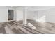 Spacious basement featuring light wood flooring, white walls and trim, and recessed lighting at 19723 Midway Blvd, Port Charlotte, FL 33948