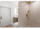 Bathroom with modern shower, gold fixtures, and tile flooring at 19723 Midway Blvd, Port Charlotte, FL 33948