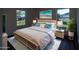 This bedroom offers a relaxing atmosphere with a beachy theme and coordinated decor at 2271 Alton Rd, Port Charlotte, FL 33952