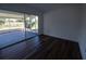 Bedroom with access to a screened-in porch and a view to the outdoors at 2271 Alton Rd, Port Charlotte, FL 33952
