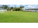 This large backyard is an open green space, great for families or entertaining guests at 2420 Linton Ln, Port Charlotte, FL 33952