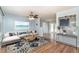 Comfortable living room with hardwood floors and an open layout to the dining area at 2420 Linton Ln, Port Charlotte, FL 33952