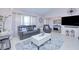 Cozy living room with neutral tones, stylish furniture, and ample natural light at 25379 Paladin Ln, Punta Gorda, FL 33983