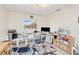Bright office space with many work surfaces and a view of the backyard at 25379 Paladin Ln, Punta Gorda, FL 33983