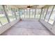 Sun room with many windows providing lots of natural light and tile flooring at 2805 Gussie St, Punta Gorda, FL 33950