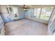 The sunroom features stone floors, an outdoor view, and indoor/outdoor living with lots of light and ventilation at 2805 Gussie St, Punta Gorda, FL 33950