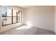 Bright bedroom featuring neutral carpeting and a sunny window, allowing for an abundance of natural light at 3256 White Ibis Ct # 24A, Punta Gorda, FL 33950