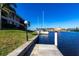 Picturesque view of a waterfront property with a dock, offering boating opportunities at 3256 White Ibis Ct # 24A, Punta Gorda, FL 33950