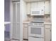 A well-equipped kitchen with ample storage and modern appliances at 3256 White Ibis Ct # 24A, Punta Gorda, FL 33950