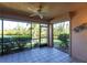 This screened lanai provides the perfect spot to relax and enjoy the canal views at 3256 White Ibis Ct # 24A, Punta Gorda, FL 33950