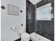 Modern bathroom with a sleek shower and white fixtures at 3616 Allapatchee Dr, Punta Gorda, FL 33950
