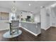 Bright kitchen features a kitchen island and stainless steel appliances at 3616 Allapatchee Dr, Punta Gorda, FL 33950