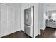 Kitchen with stainless steel refrigerator and ample storage space at 3616 Allapatchee Dr, Punta Gorda, FL 33950