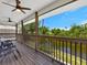 Expansive screened lanai featuring ceiling fans and views of the water at 3616 Allapatchee Dr, Punta Gorda, FL 33950