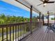 Enjoy expansive outdoor living space on the screened lanai with ceiling fans and views of the water at 3616 Allapatchee Dr, Punta Gorda, FL 33950