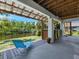 Outdoor patio features a waterfront view, wooden deck, and sun bathing lounge chair at 3616 Allapatchee Dr, Punta Gorda, FL 33950