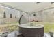 A close view of a hot tub on a screened patio, perfect for relaxation at 4044 S Salford Blvd, North Port, FL 34287