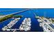 Amazing aerial view of the marina showing boats neatly docked in a peaceful setting at 4089 Yucatan Cir, Port Charlotte, FL 33948