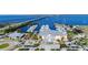 Stunning aerial view of the marina featuring boats and the bridge in the background at 4089 Yucatan Cir, Port Charlotte, FL 33948