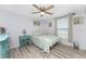 Cozy bedroom with wood laminate flooring and neutral colored walls at 4089 Yucatan Cir, Port Charlotte, FL 33948